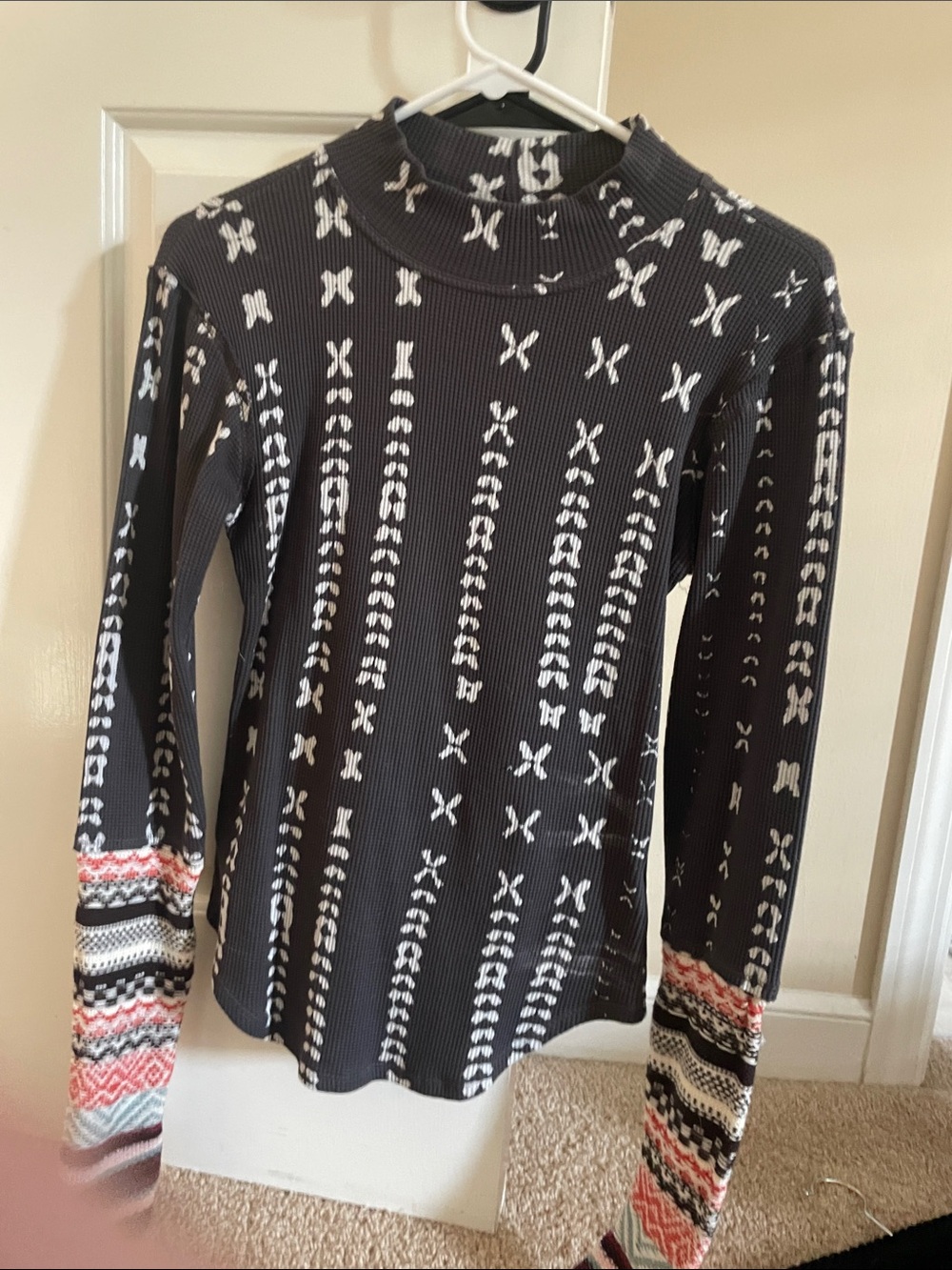 Free people mock neck Black Patterned Long-Sleeve Top with Coral Accent Sleeves
